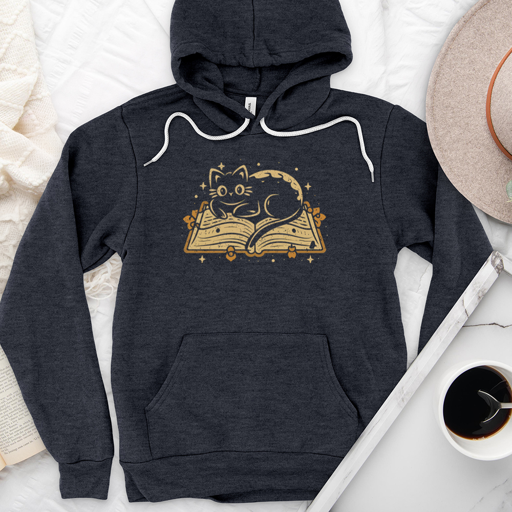 cat on a book premium hoodie sweatshirt