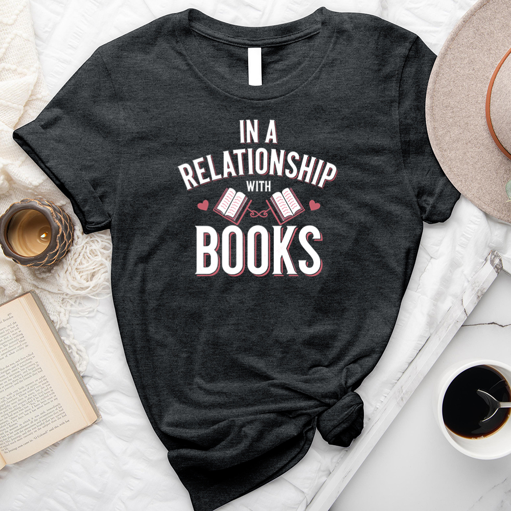 in a relationship with books unisex tee