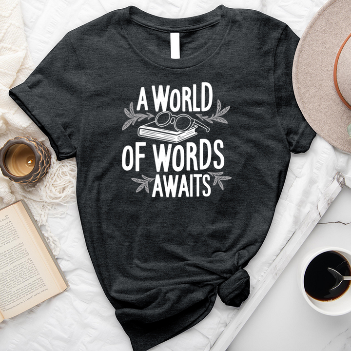 a world of words awaits unisex tee