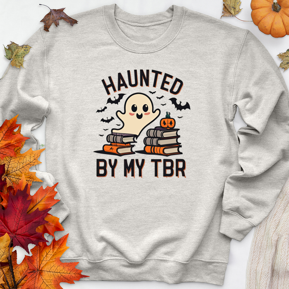 haunted by my TBR premium crewneck sweatshirt