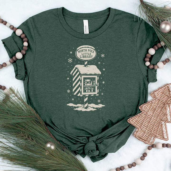 north pole little library unisex tee
