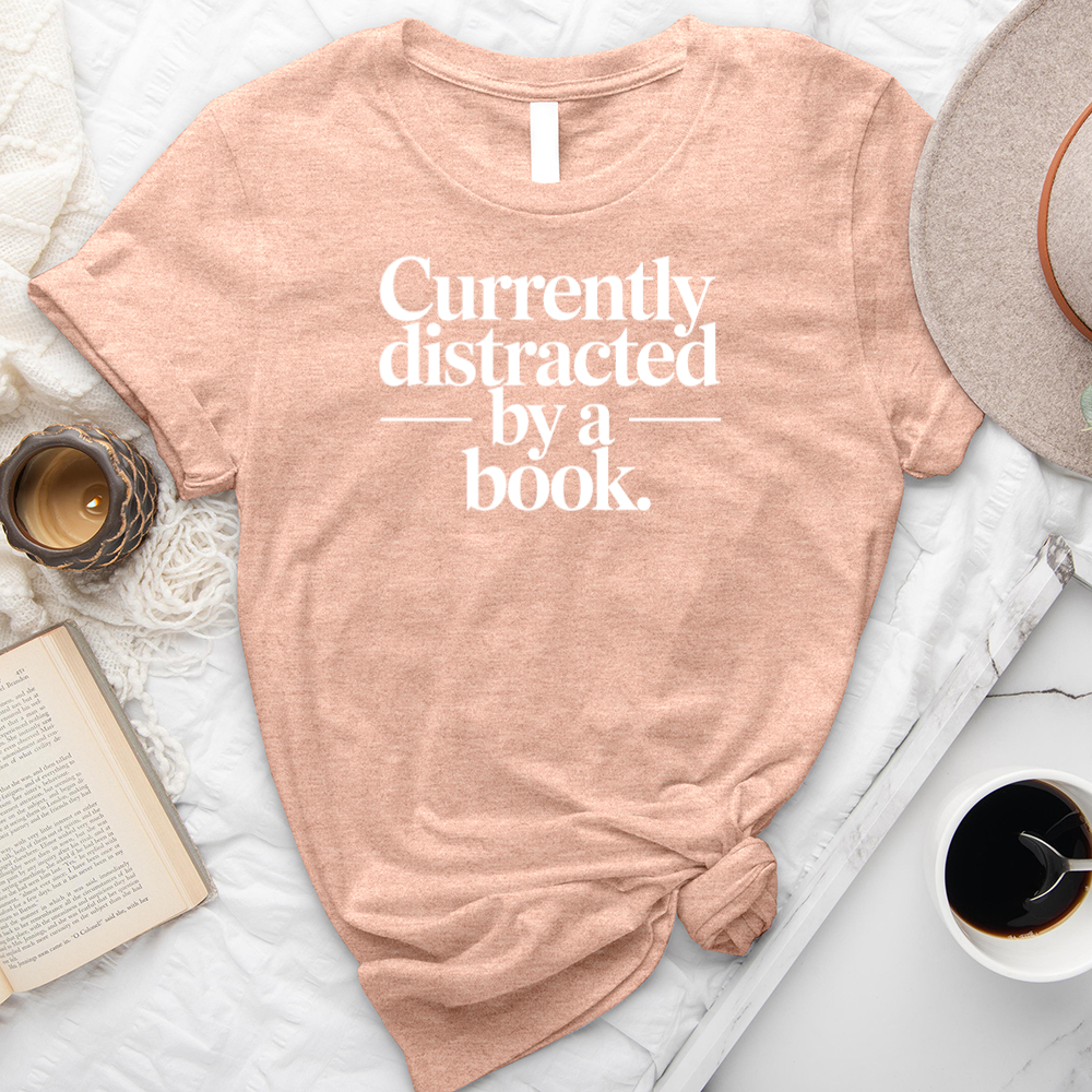 currently distracted by a book unisex tee