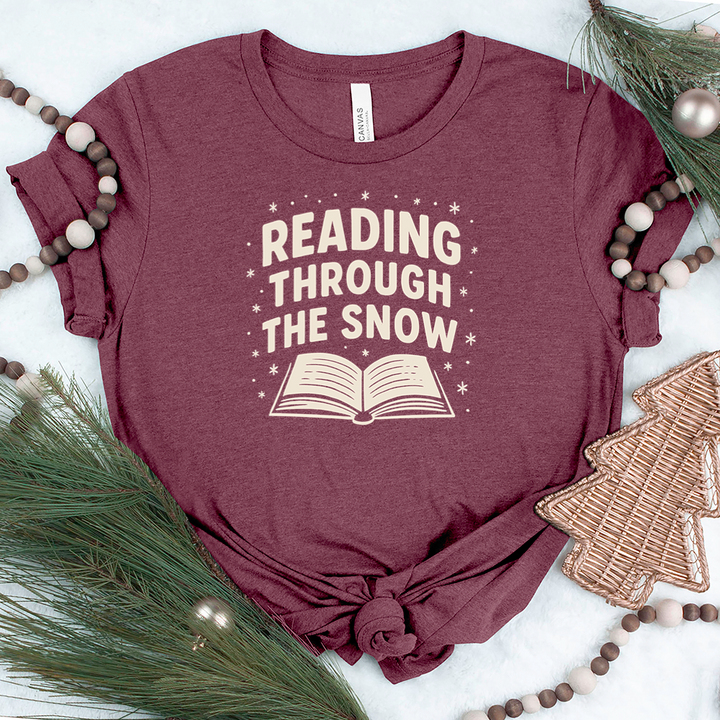 reading through the snow unisex tee