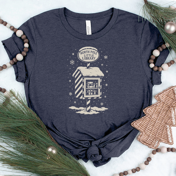 north pole little library unisex tee