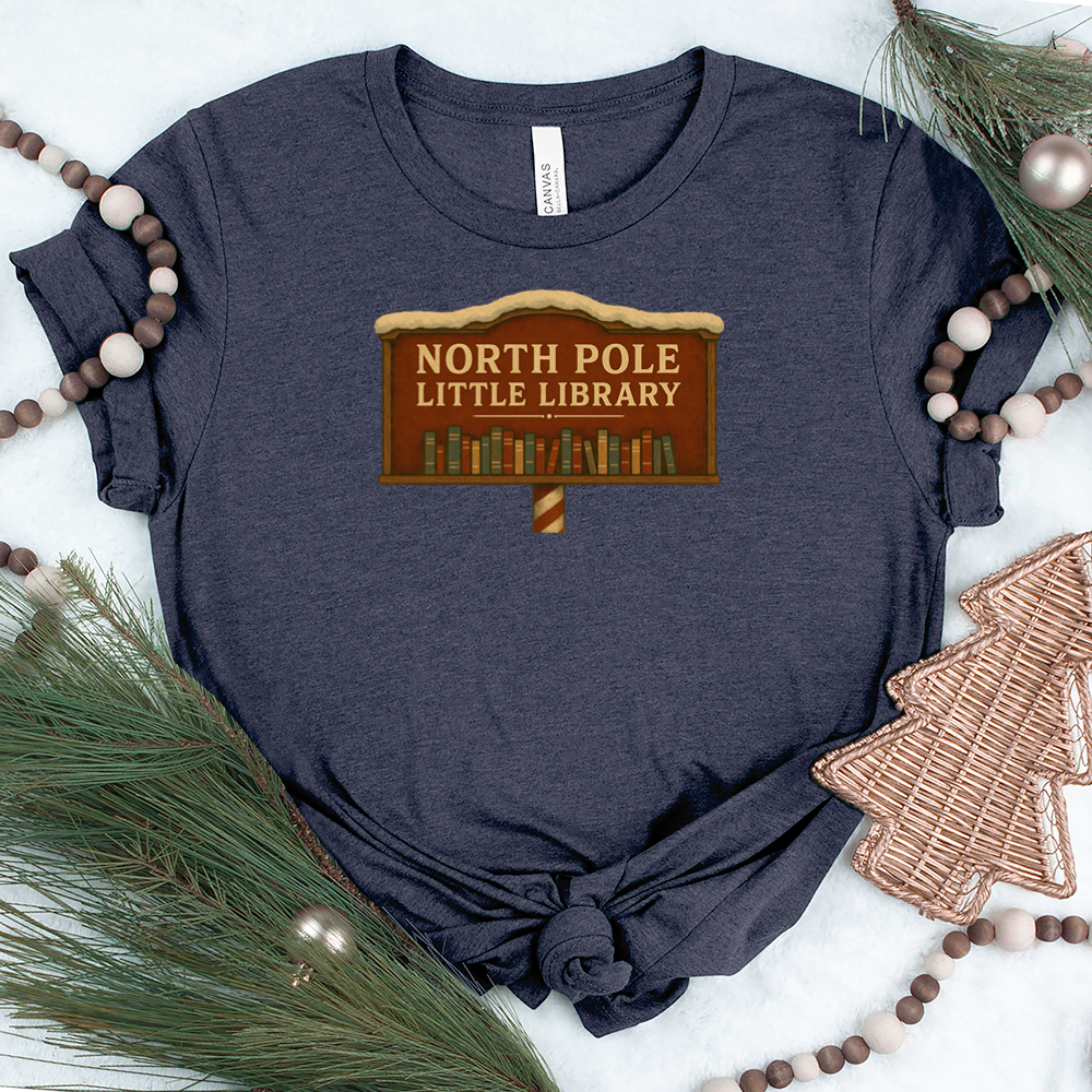 north pole little library sign unisex tee