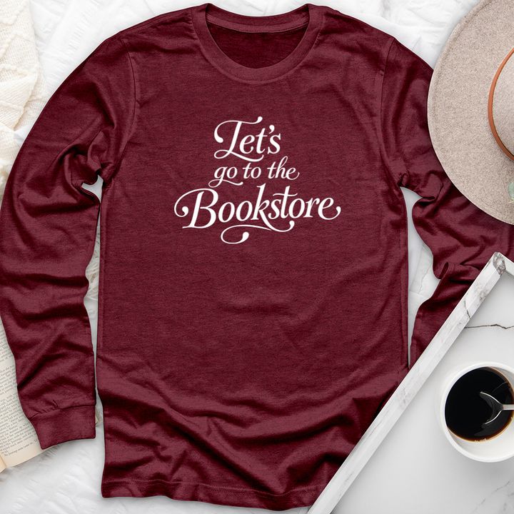 let's go to the bookstore long sleeve unisex tee