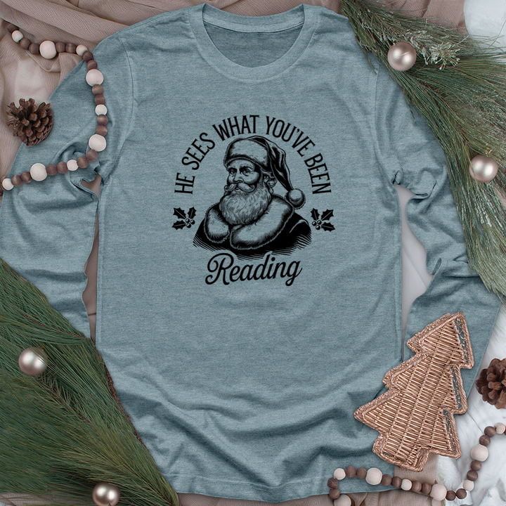 he sees what you've been reading long sleeve unisex tee