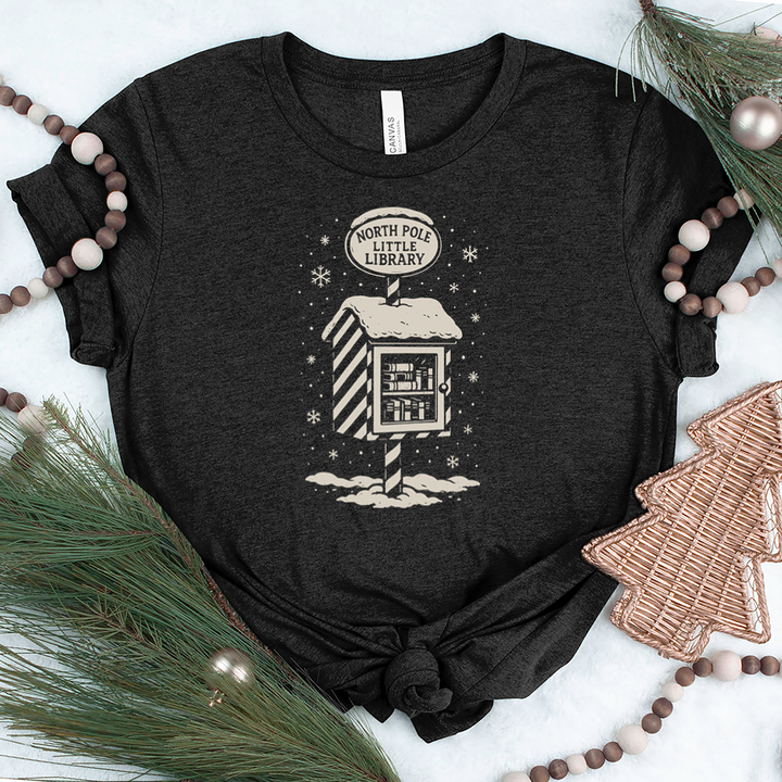 north pole little library unisex tee