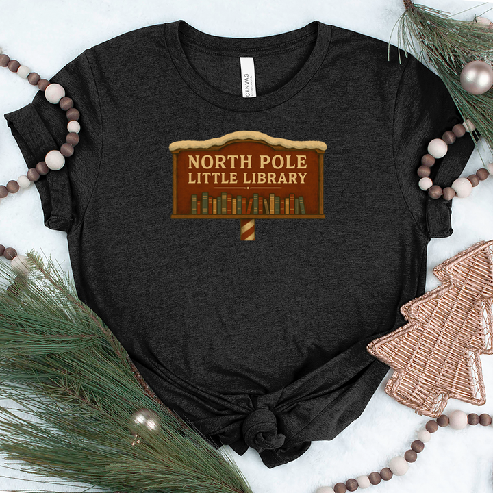 north pole little library sign unisex tee
