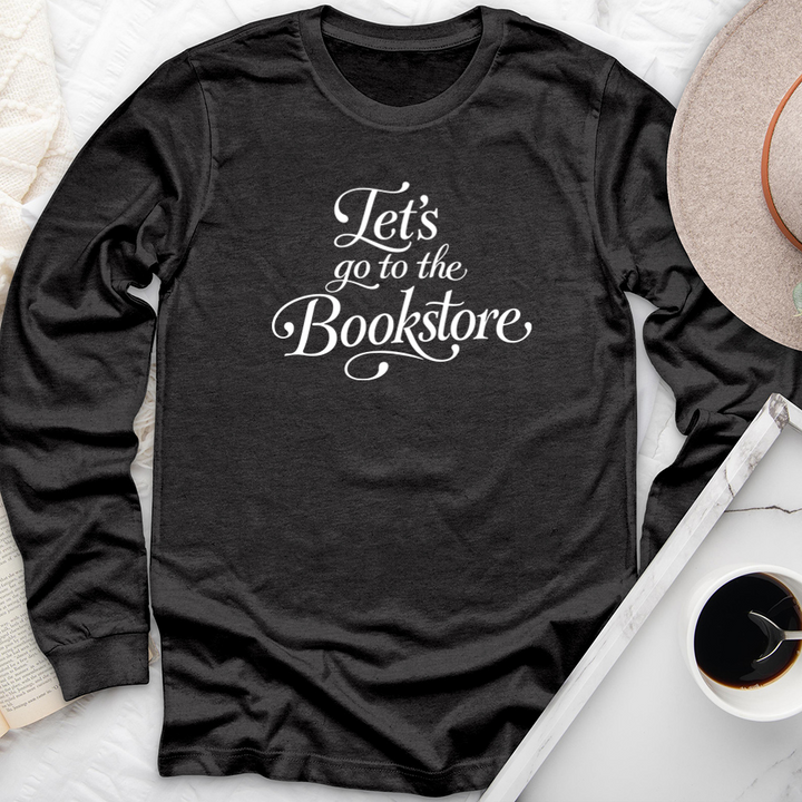 let's go to the bookstore long sleeve unisex tee