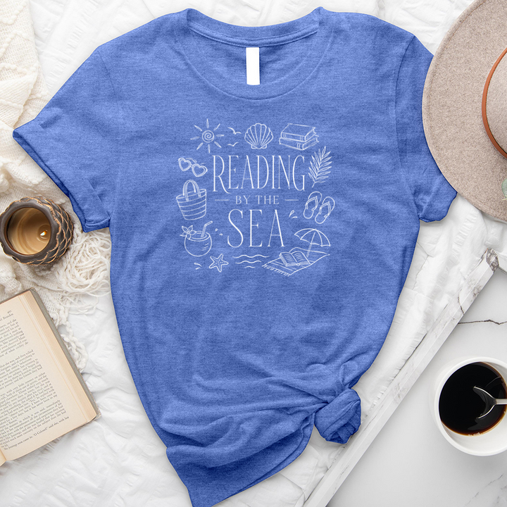 reading by the sea unisex tee