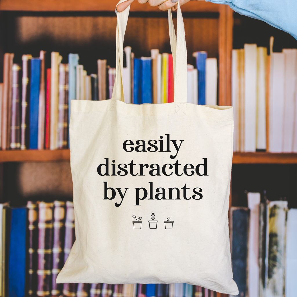 easily distracted by plants tote bag