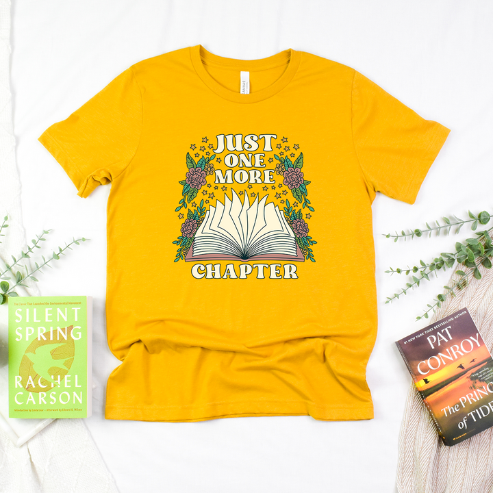 just one more chapter open book unisex tee