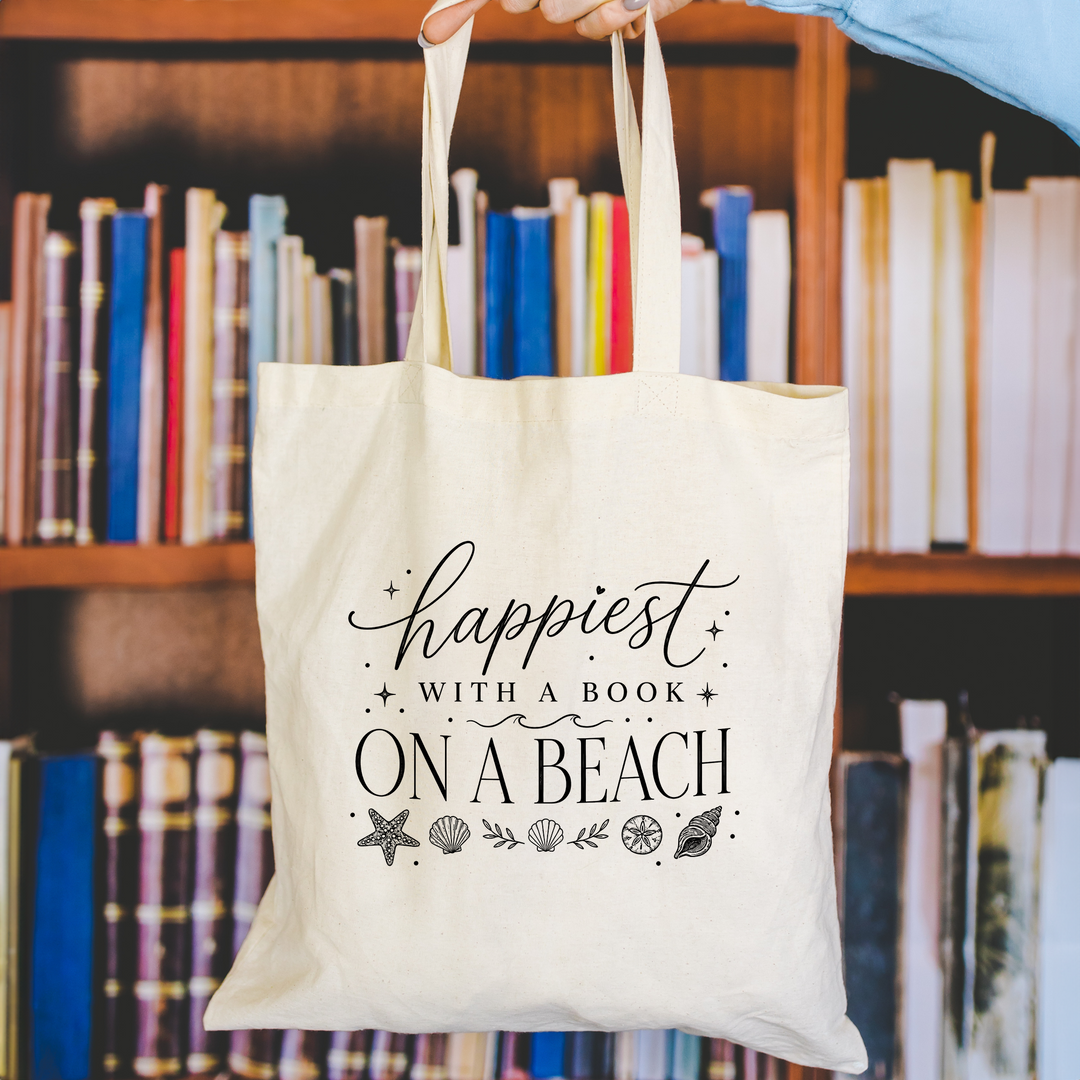 happiest with a book on a beach tote bag