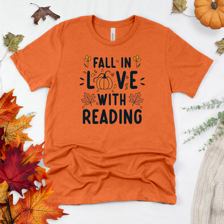 fall in love with reading pumpkin unisex tee