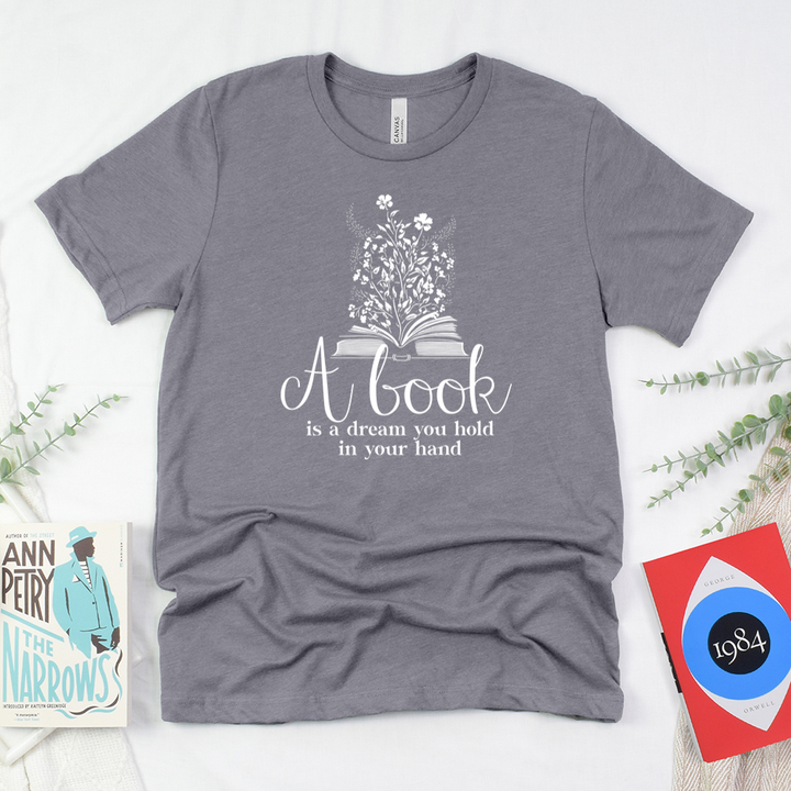 a book is a dream unisex tee