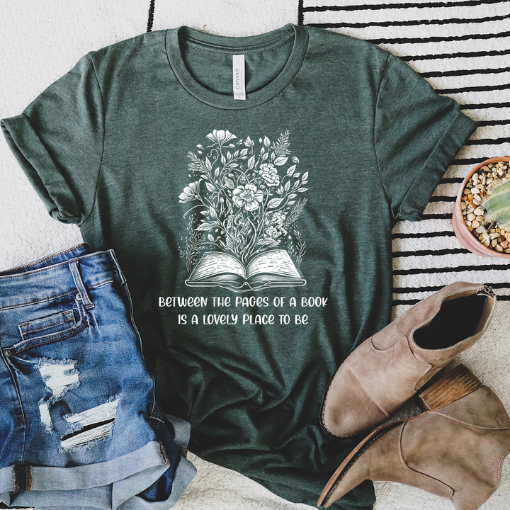 between the floral pages unisex tee