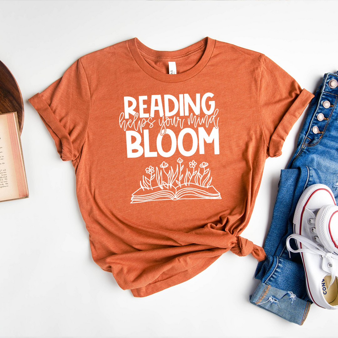 reading helps your mind bloom unisex tee